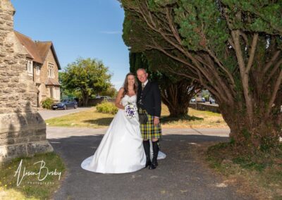 Bride and father at Our Lady and St Edmunds Church in Abingdon, Oxfordshire.