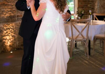 Rackleys wedding photography. Bride and groom first dance inside Rackleys Barn.