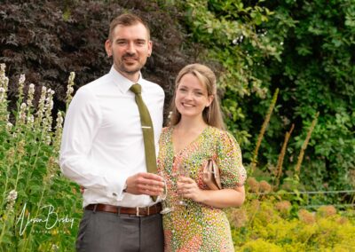 Wedding guest portraits. Young couple at Sheepdrove wedding.