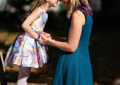 Wedding guest portraits. Mother and young daughter