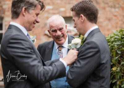 Wedding photography for older couples. Groom with sons.