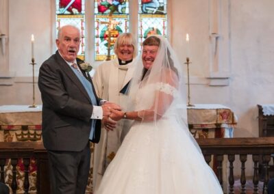 Wedding photography for older couples. Bride and groom during ceremony.