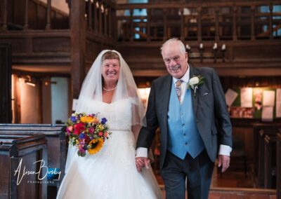 Wedding photography for older couples. Bride and groom in church