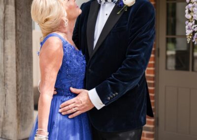 Wedding photography for older couples. Bride and groom portrait. Blue wedding dress.