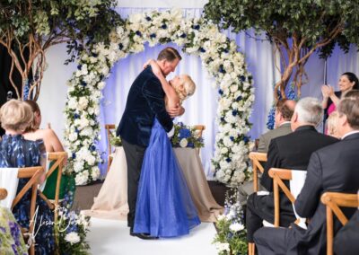 Wedding photography for older couples. Bride and groom first kiss