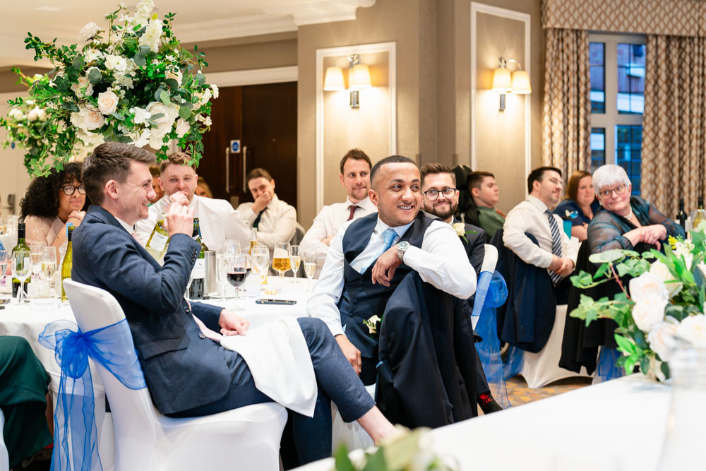 Guests enjoying the wedding speeches at the Bull Hotel in Gerrards Cross