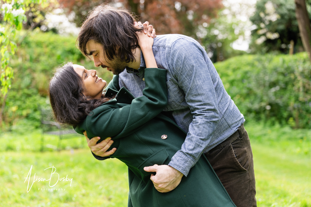 Amersham engagement photos. Young couple in romantic dip during Buckinghamshire shoot.