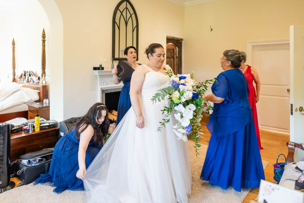 Notley Abbey bridal prep. Final stages of preparation with bridesmaids