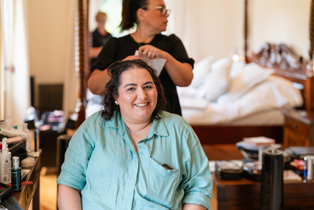 Notley Abbey wedding photographer. Bridal prep in the Notley Suite.