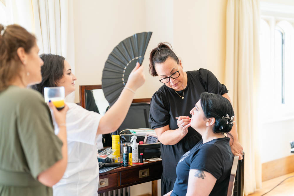Notley Abbey wedding photographer. Bridal prep in the Notley Suite.