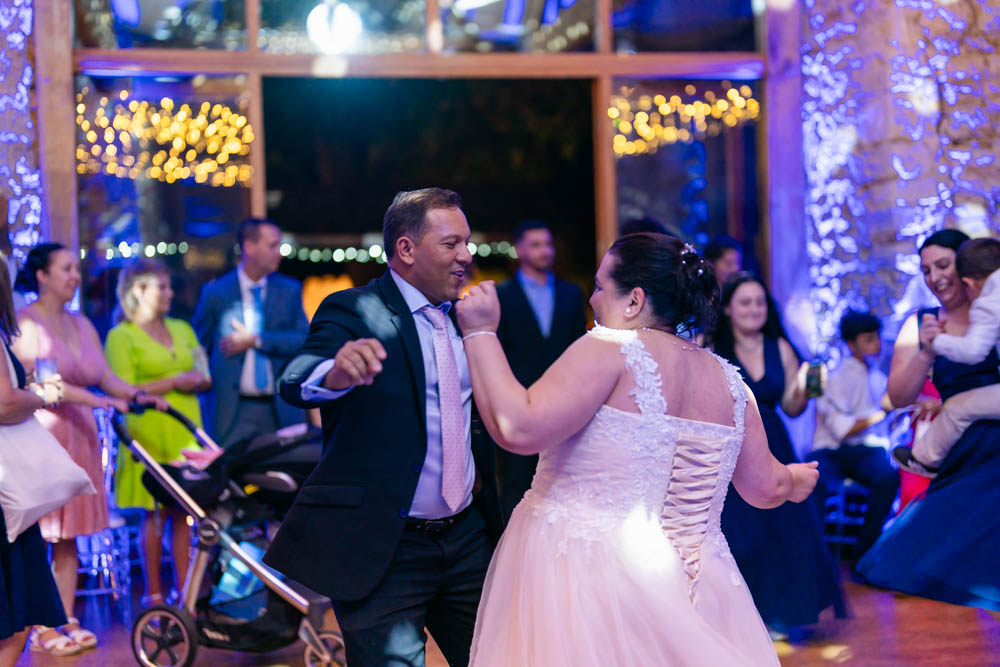Notley Abbey wedding photographer. Guests dancing in the Monks refectory.