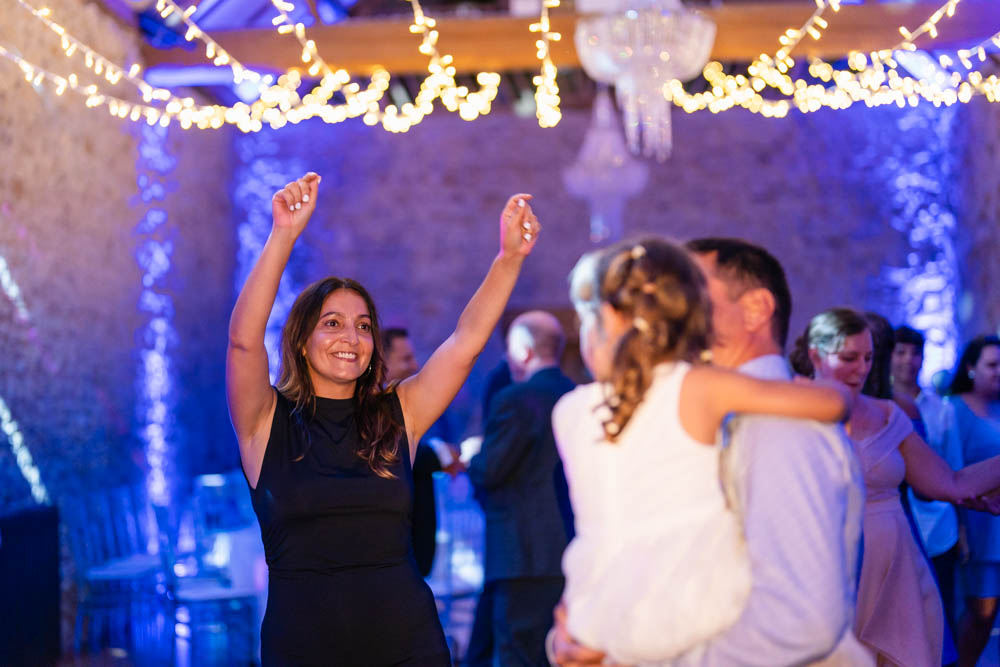 Notley Abbey wedding photographer. Guests dancing in the Monks refectory.