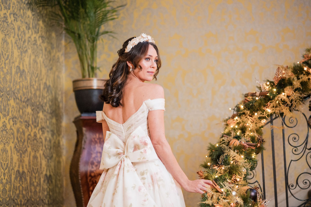 Hedsor house wedding photography. bride on staircase