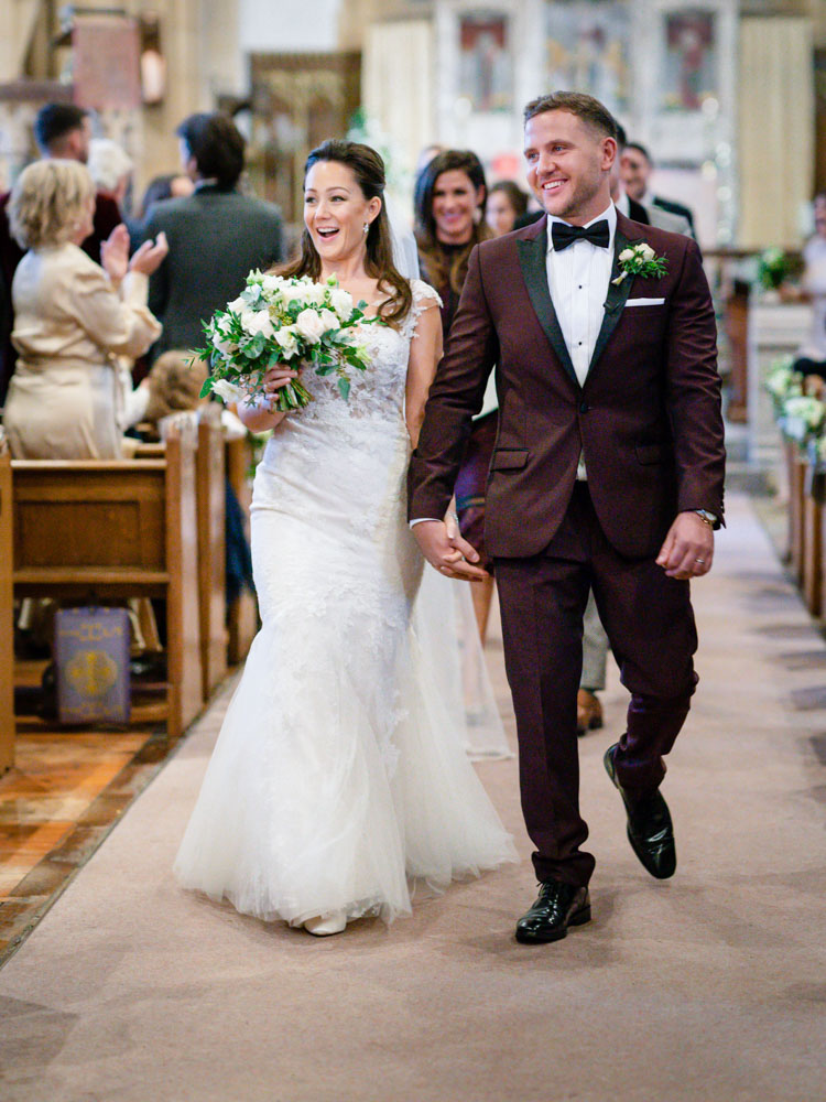 Wedding photography buckinghamshire. bride and groom leaving marlow church