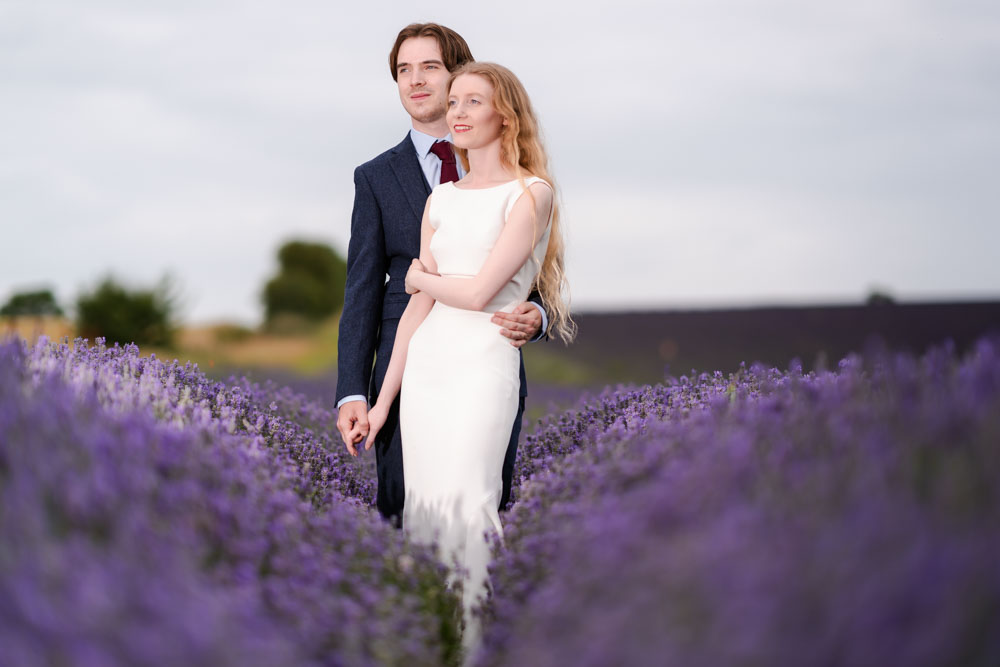 Wedding photography Hertfordshire. Bride and groom in lavender field