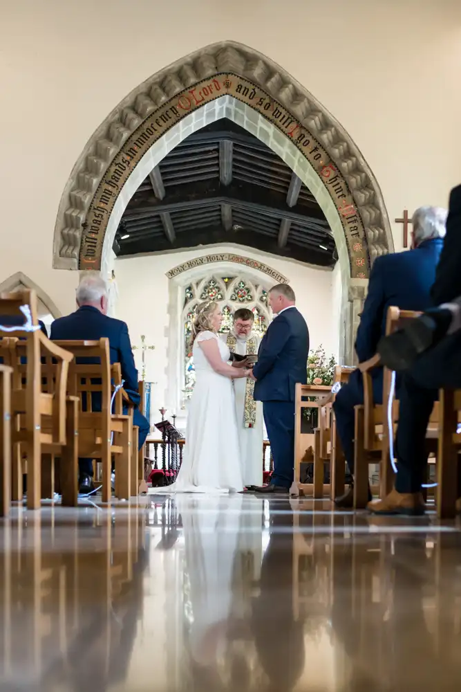 Bride and groom exchange vows in Stokenchurch wedding
