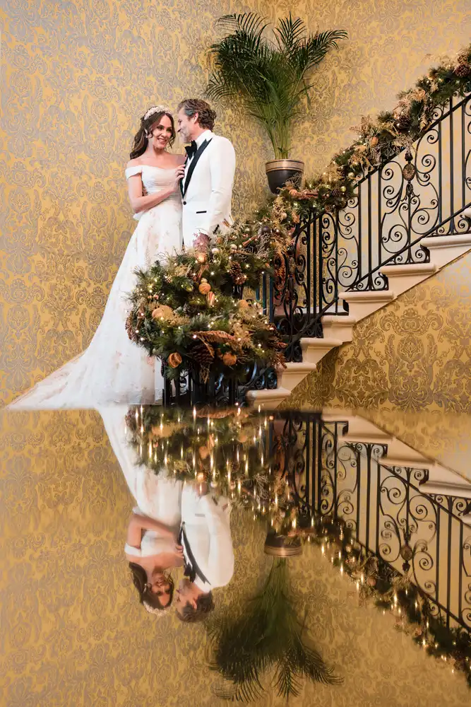Buckinghamshire wedding photography of couple on staircase of Hedsor House