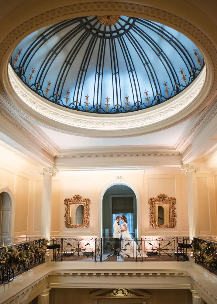 Buckinghamshire wedding photography of couple in dome of Hedsor House
