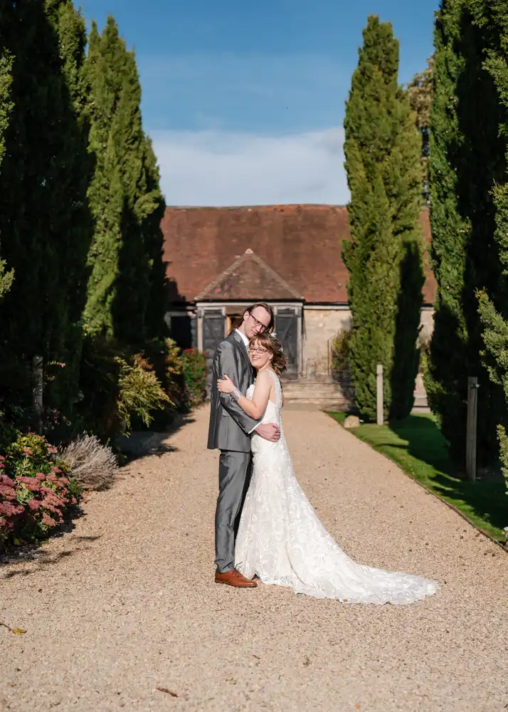 Buckinghamshire wedding photography of Bride and groom at Notley Tythe Barn wedding.