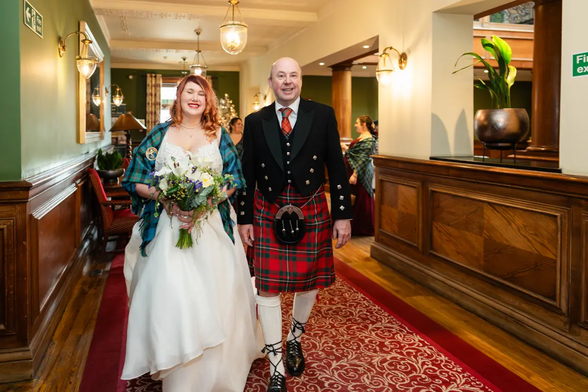 Bride and father leaving Milton Hill House for Garden house venue wedding.