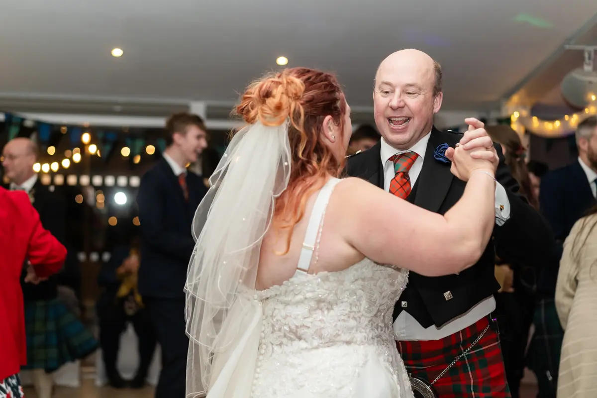 Bride dances with father at the Garden House Venue wedding in Steventon, Oxfordshire.