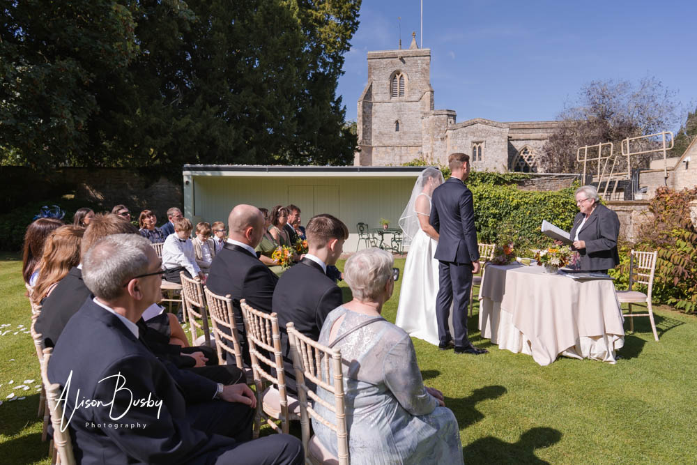Natural wedding photography at Le Manoir aux Quat'Saisons in Oxfordshire. Outdoor wedding ceremony at La Belle Époque