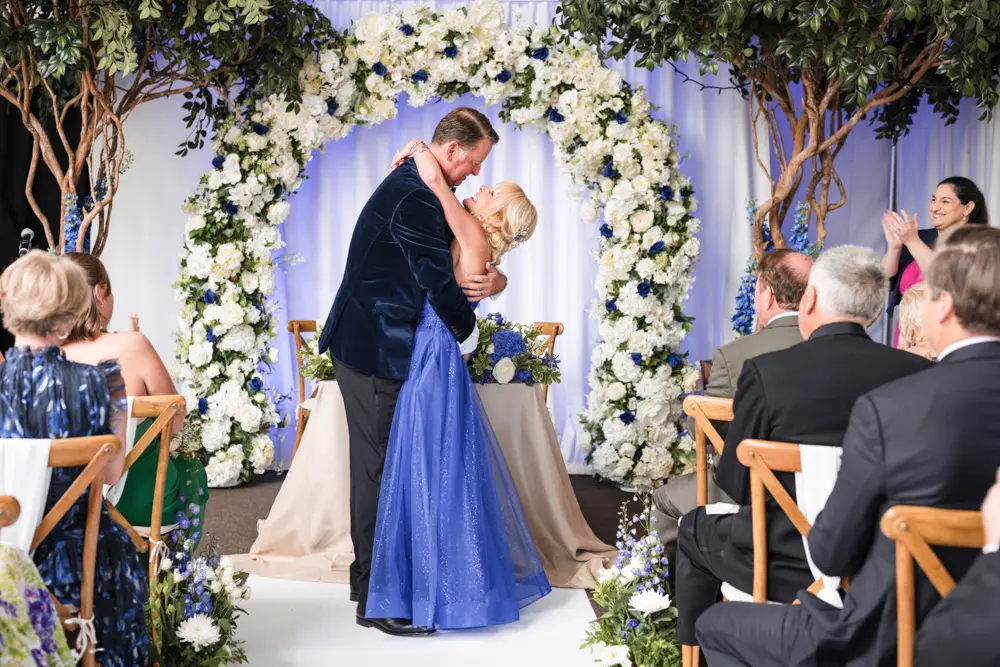 Hurley House Hotel Wedding. Bride and groom first kiss.