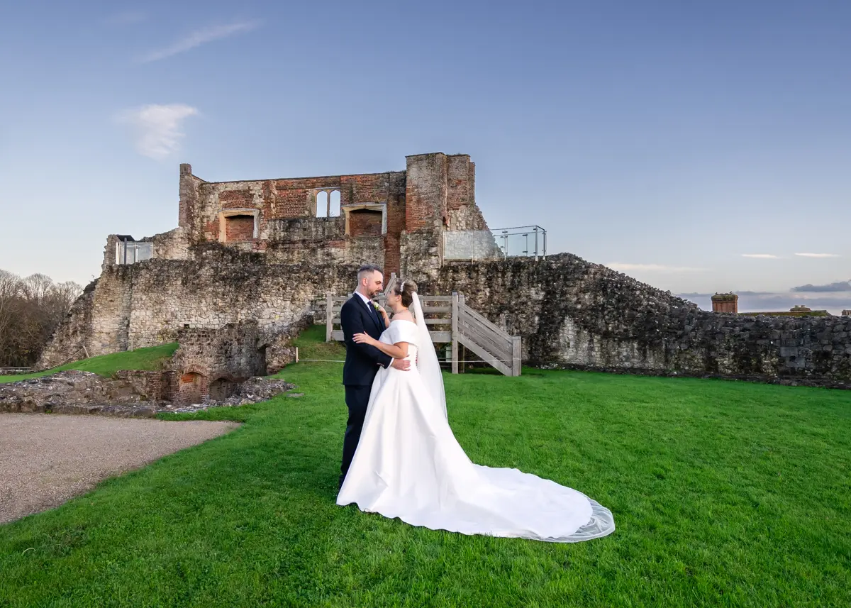 Bride and groom in castle keep at their Farnham Castle wedding.