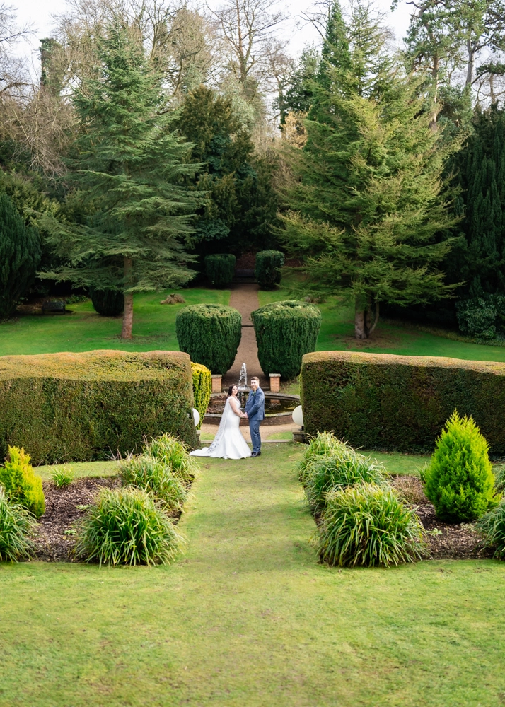 Bride and groom portrait in gardens. Hunton Park wedding photographer.