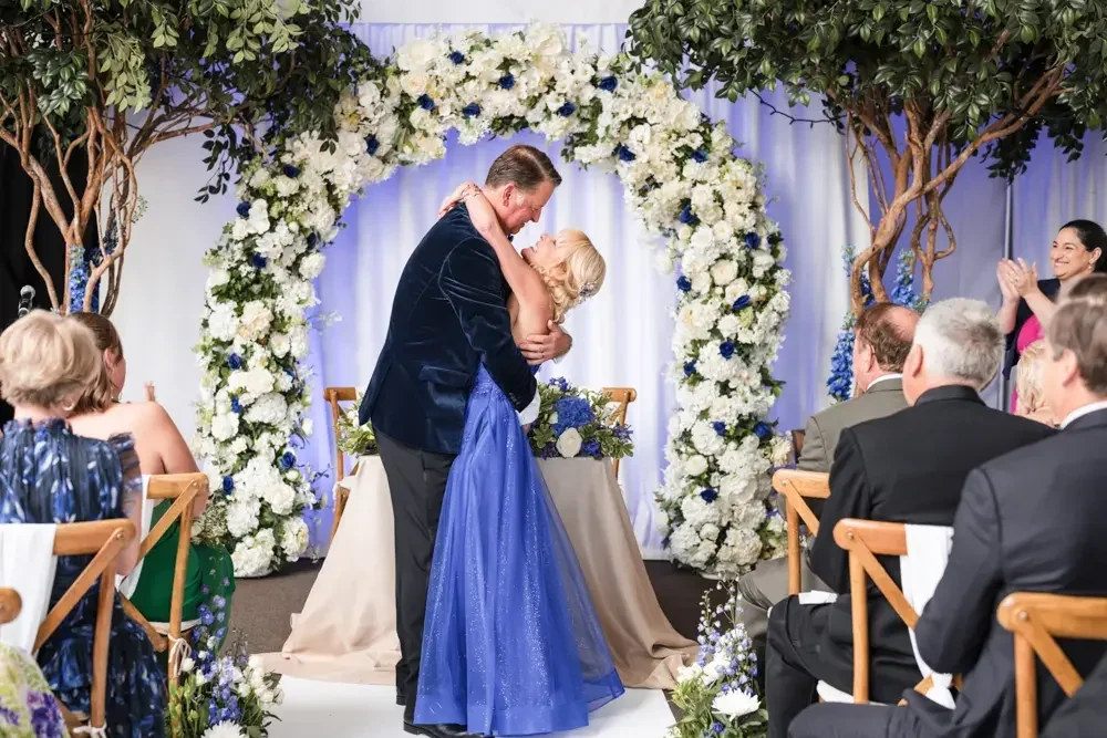 Hurley House Hotel wedding. Bride and groom first kiss.