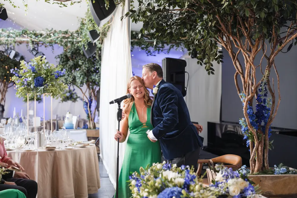 Hurley House Hotel wedding. Groom comforting daughter.
