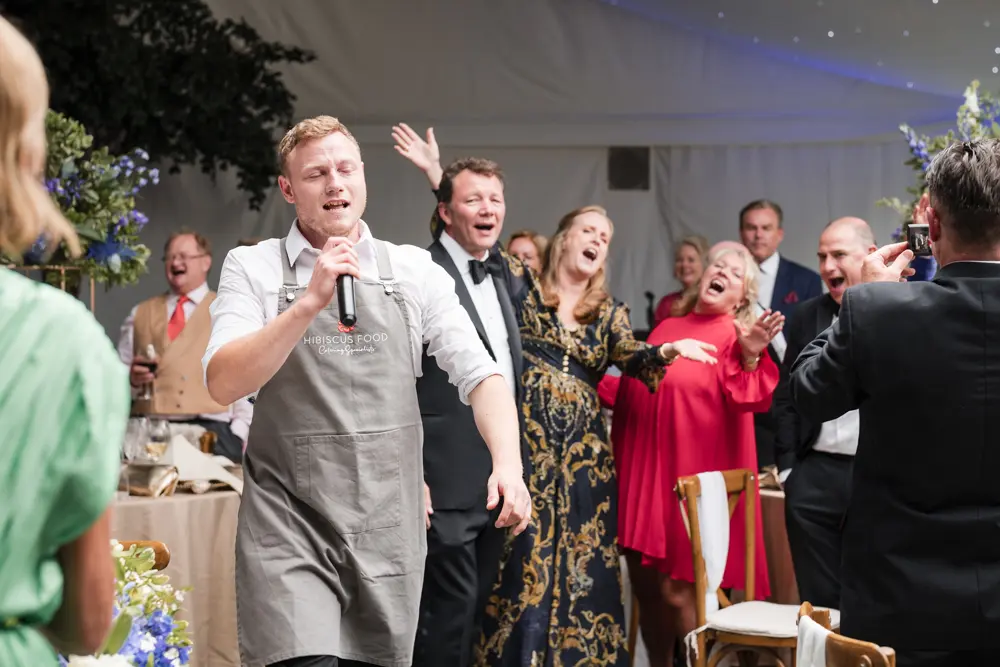 Hurley House Hotel wedding. Guests and singing waiter.