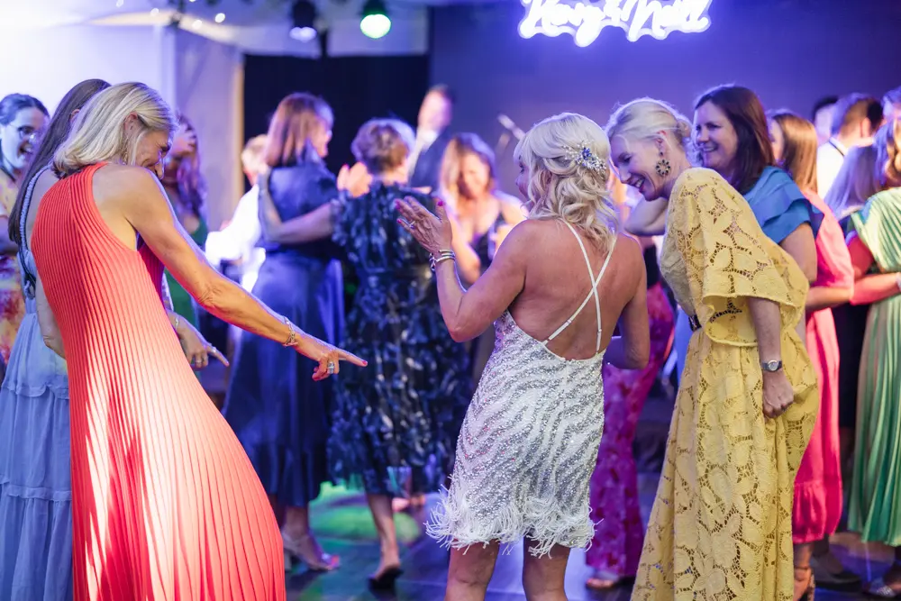 Hurley House Hotel wedding. Guests dancing with bride.