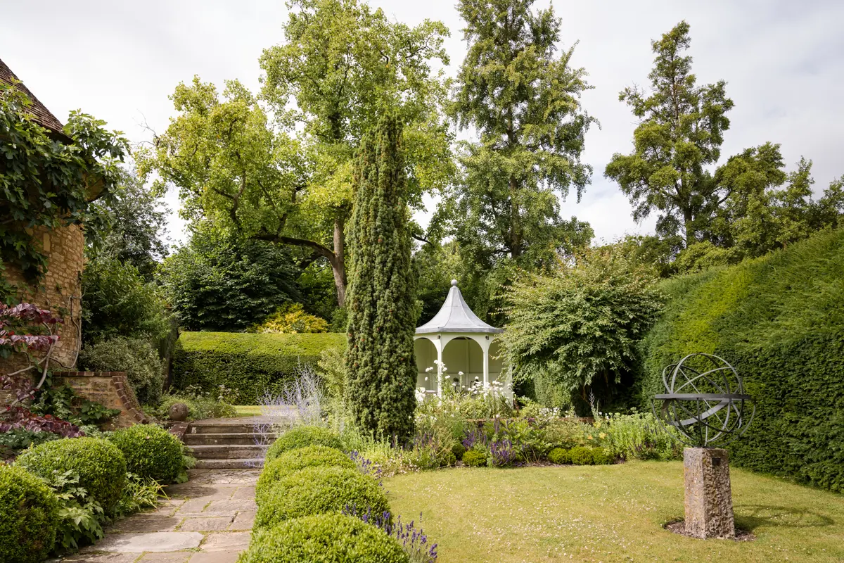 Garden with gazebo at Le Manoir aux Quat'Saisons.