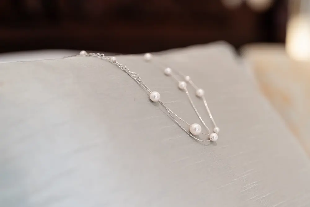 Notley Abbey Wedding photography. Bridal necklace.