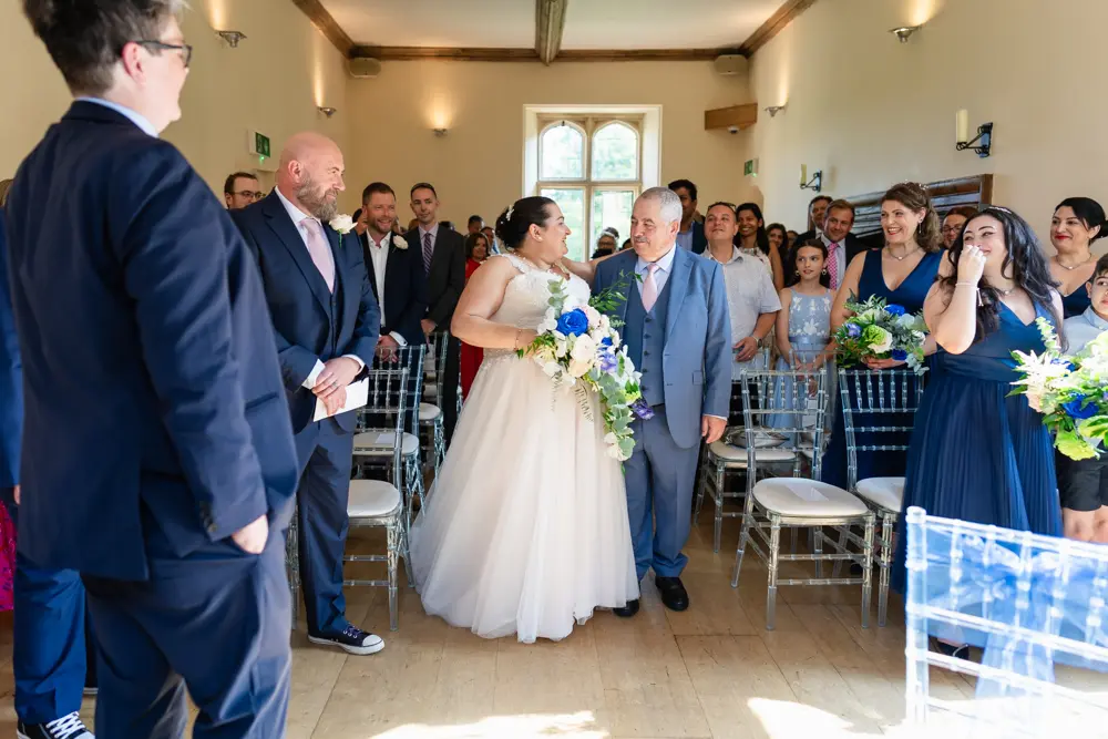 Notley Abbey Wedding photographer. Bride arrives for ceremony.