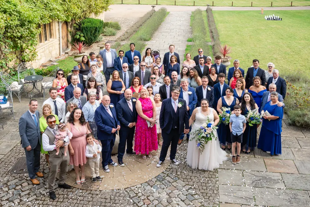Notley Abbey Wedding photographer. Photo of all guests from upstairs window.