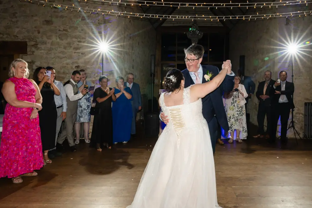 Notley Abbey Wedding photographer. First dance in monk's refectory.