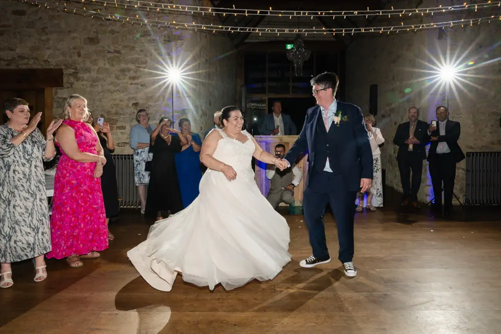 Notley Abbey Wedding photographer. First dance in monk's refectory.