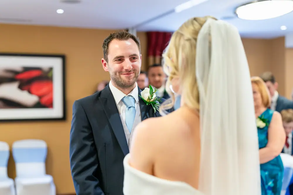 Bull Hotel wedding photography. Bride and groom during wedding vows.