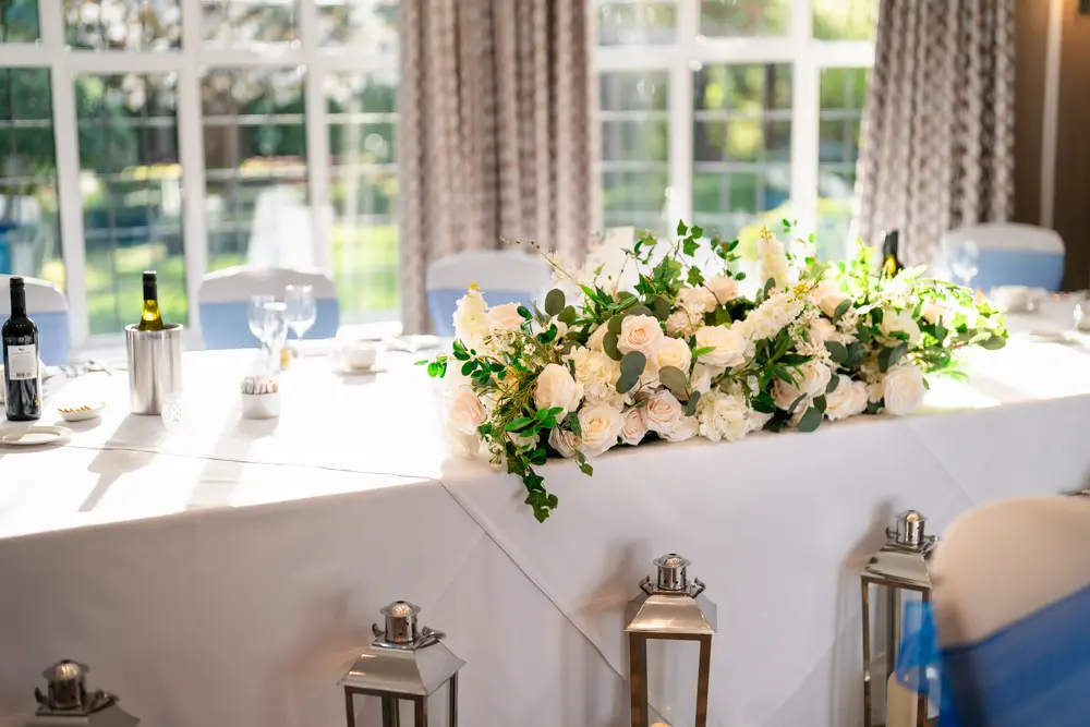 Bull Hotel wedding photography. Bride and groom top table.