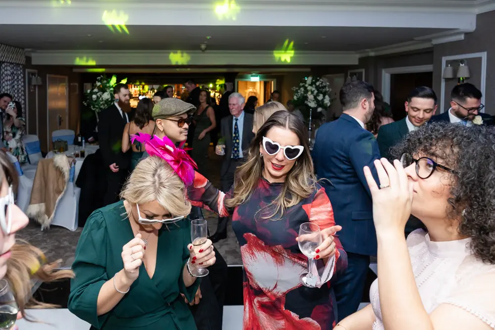 Bull Hotel wedding photography. Wedding guests dancing.