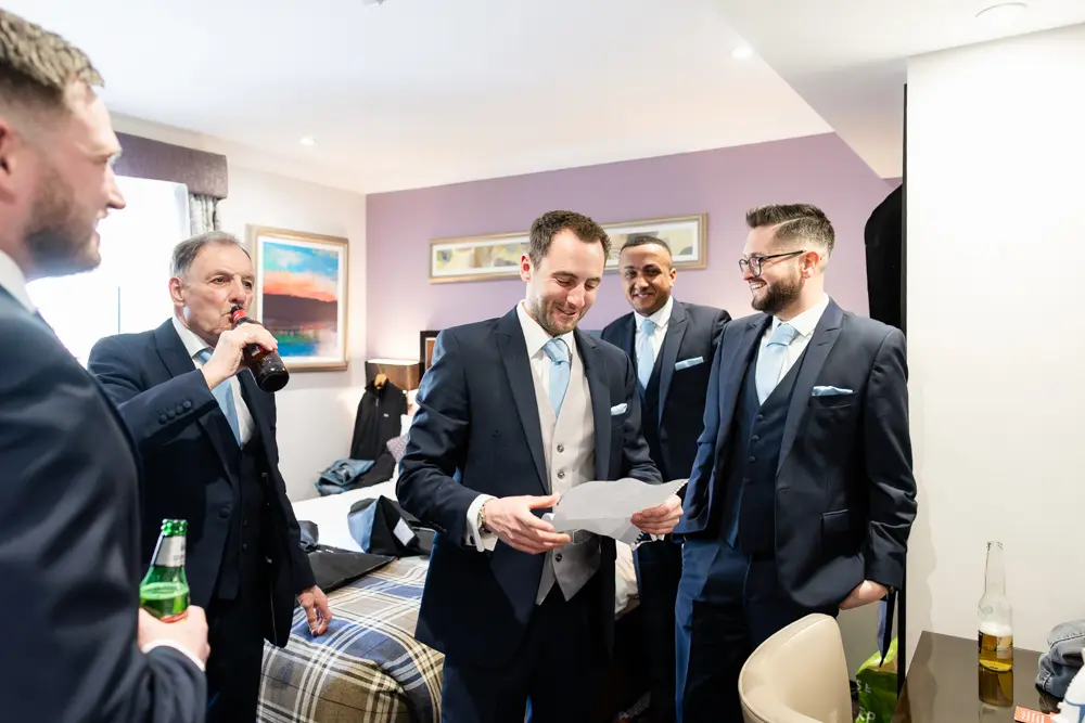 Bull Hotel wedding photography. Groom prep.