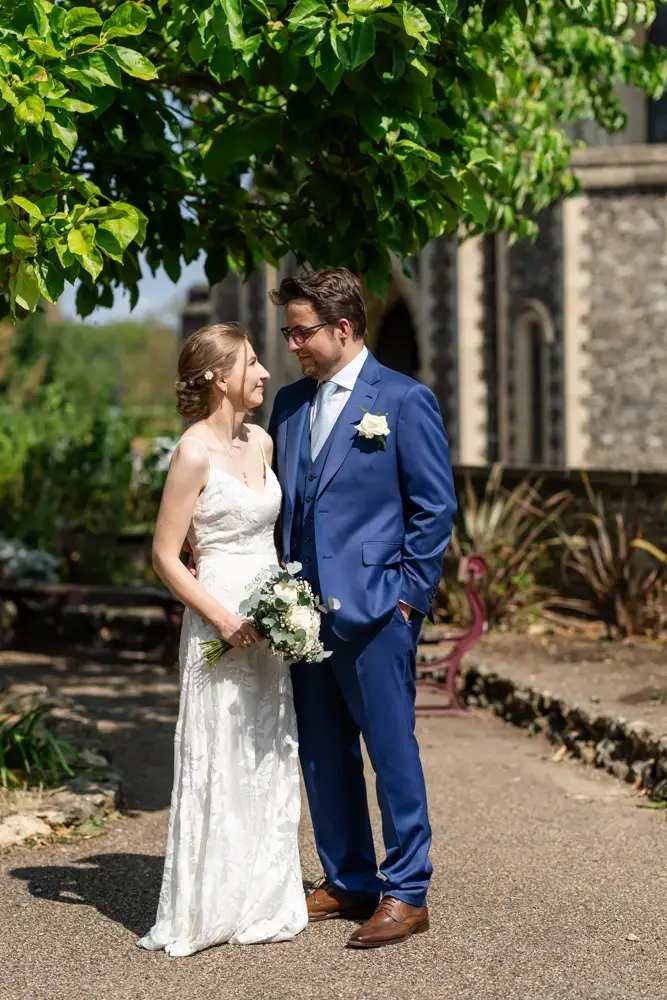 Bride and groom under tree. Forbury Gardens wedding photos. Reading, Berkshire.