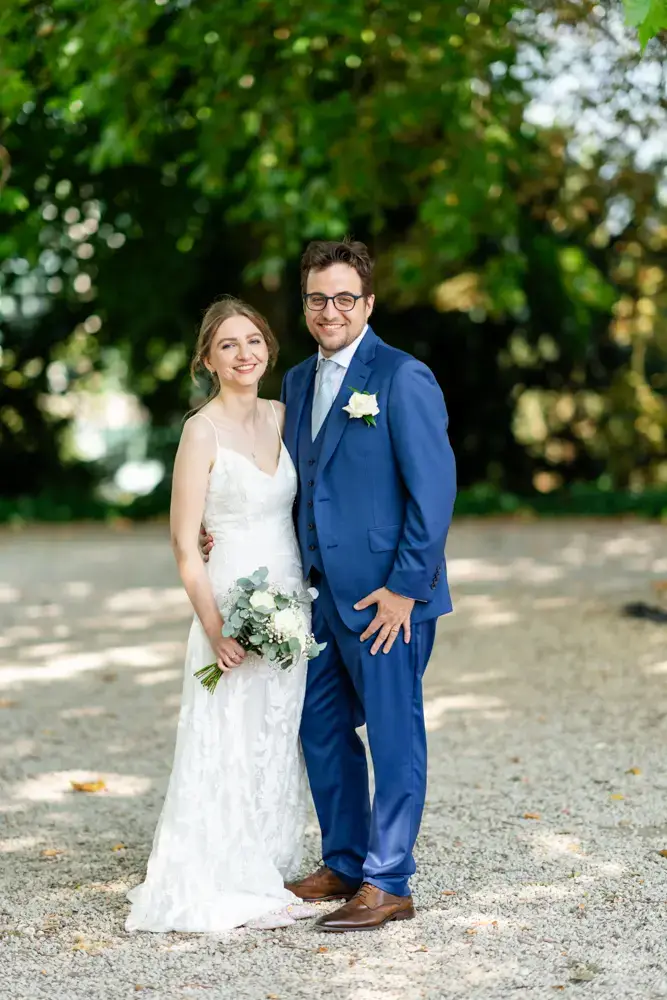 Bride and groom under tree. Forbury Gardens wedding photos. Reading, Berkshire.