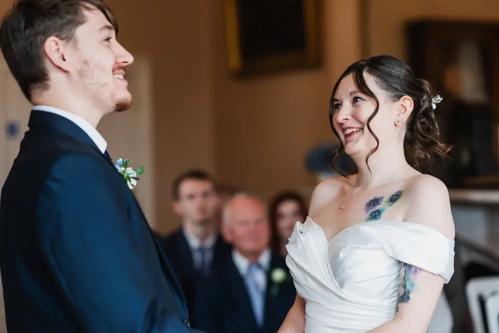 Bride and groom exchange vows. Judges Lodgings Aylesbury wedding.