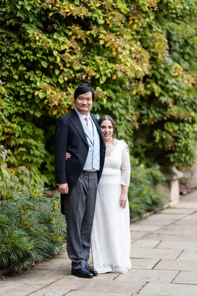 Lincoln college Oxford wedding photographer. Bride and groom in front quad.
