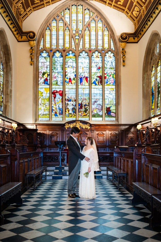 Lincoln college Oxford wedding photographer. Bride and groom in chapel of Lincoln college.