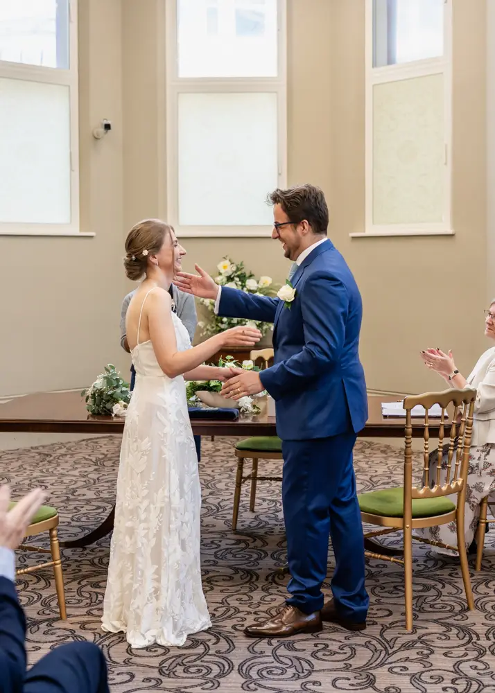 Bride and groom during ceremony. Reading Town Hall Wedding photographer
