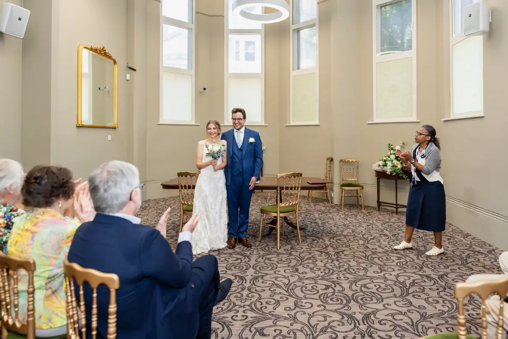 Bride and groom during ceremony. Reading Town Hall Wedding photographer